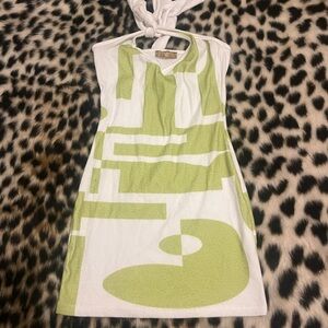 70s style mini dress. Green and white pattern. Good condition!